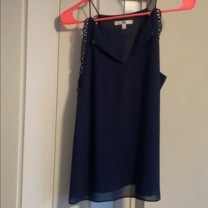 Blue sleeveless blouse